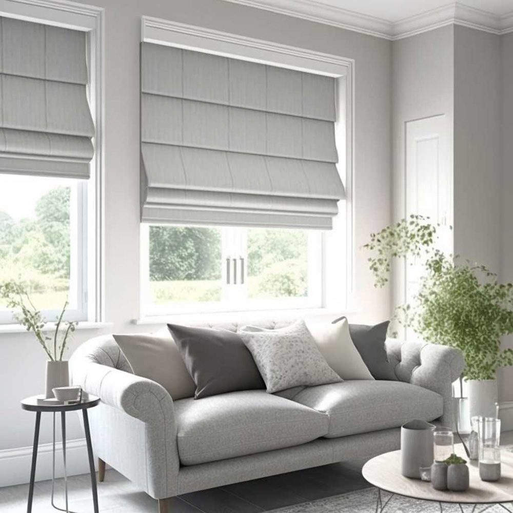 Grey roman blinds in grey lounge room setting